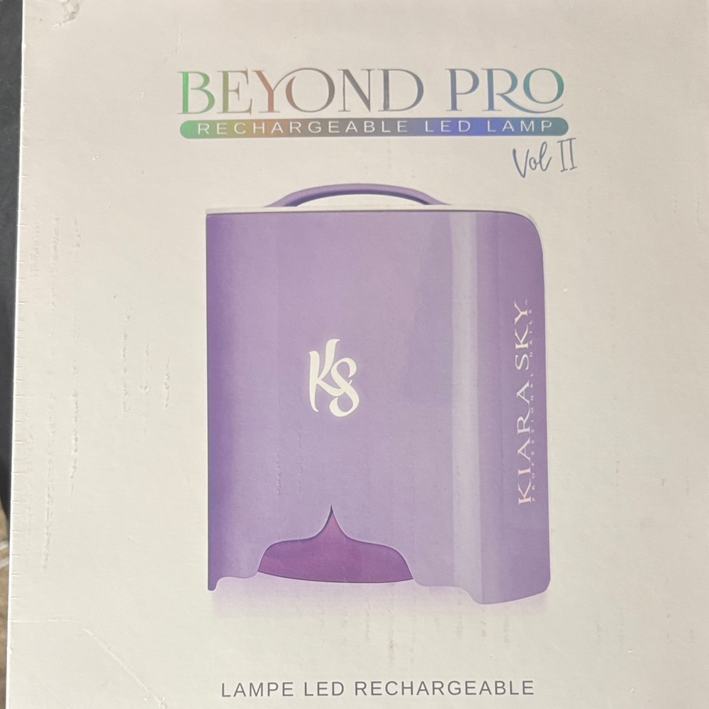 Brand New, Never Opened Kiara Sky Beyond Pro Rechargeable LED Lamp - Purple